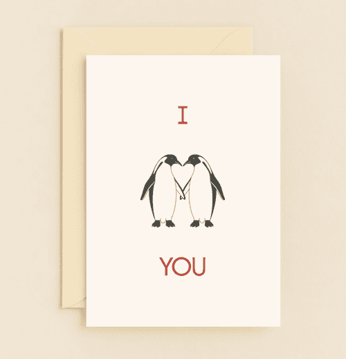 Celebrate Valentine's Day with "Penguin Love: Heartfelt Moments," a charming card featuring penguins forming a heart, perfect for pun-filled romance.