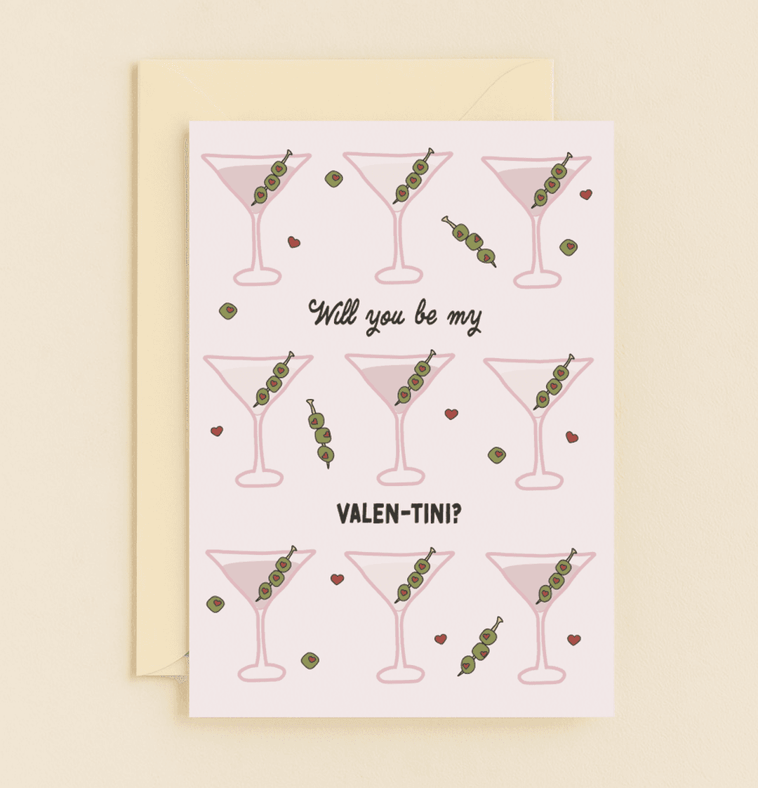 Celebrate Valentine's Day with a playful card featuring martini glasses, olives, and witty wordplay for a fun twist on love.
