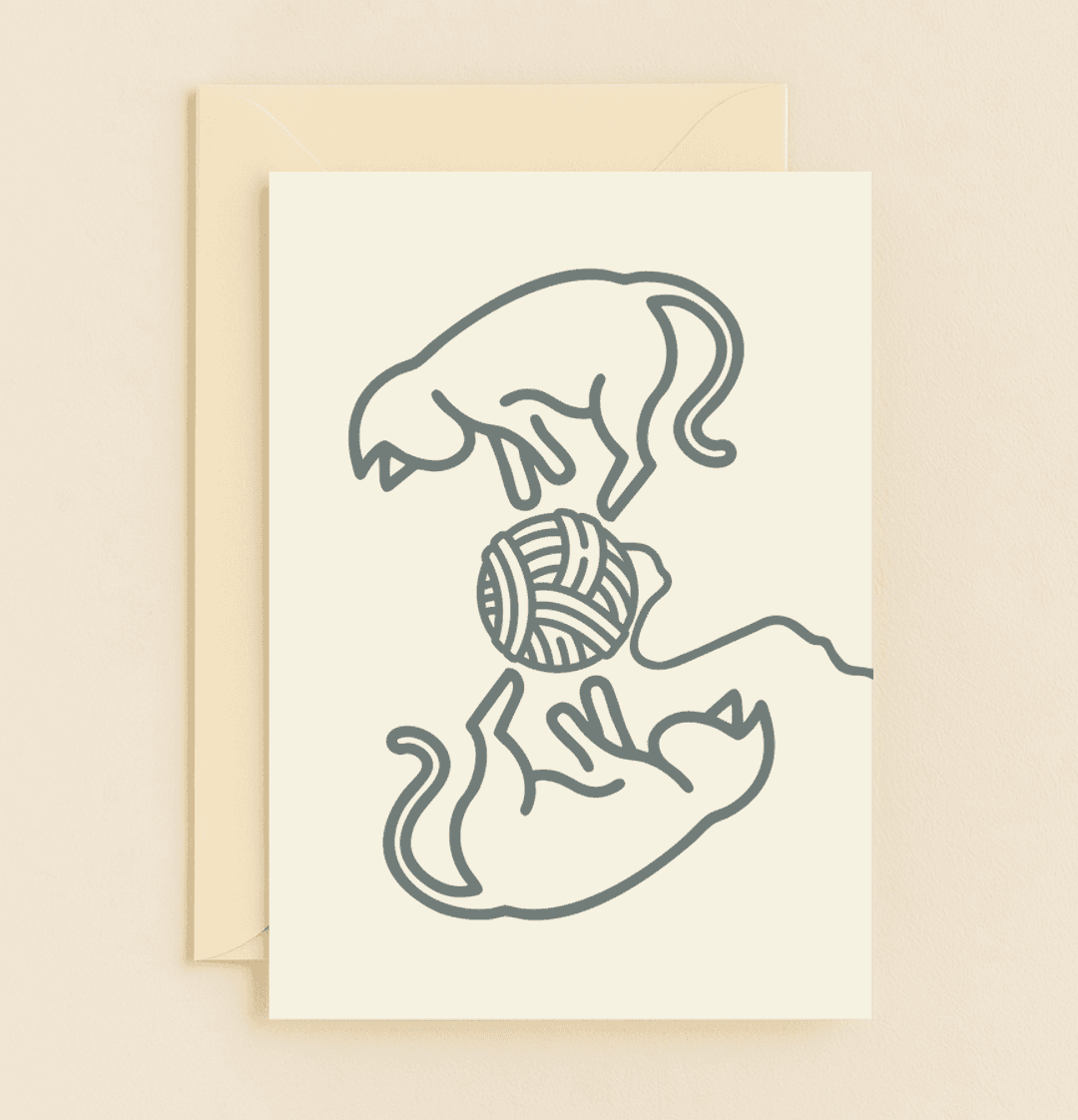 Delight someone special with a charming "Thinking of You" card featuring playful cats and a yarn ball, perfect for cat lovers who appreciate whimsical humor.