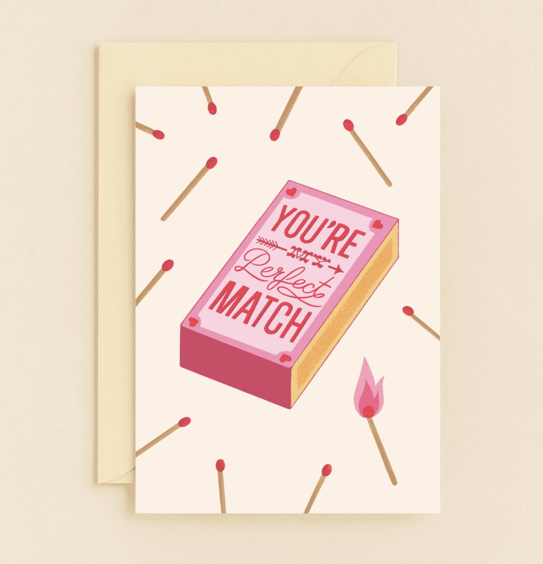 Ignite the flame of love this Valentine's Day with a playful card featuring a matchbox, hearts, and wordplay: "You're My Perfect Match.
