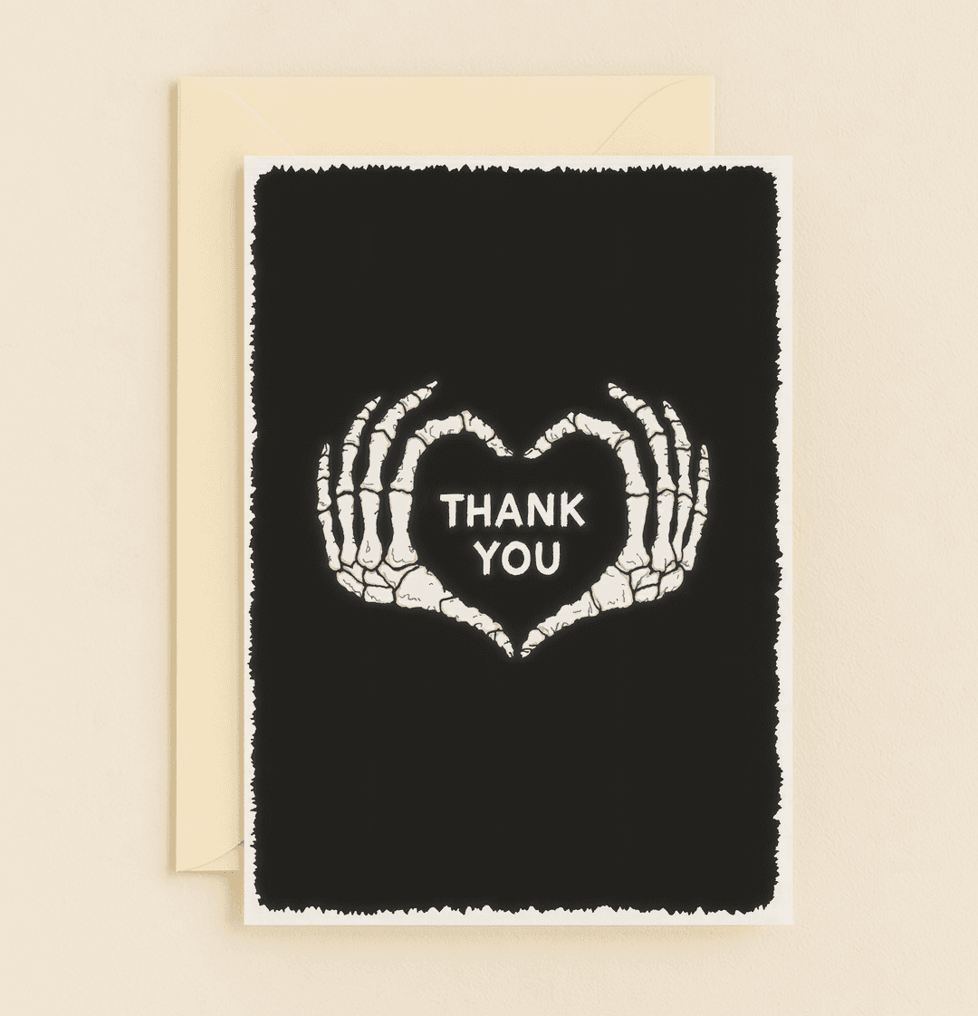 Express gratitude with a gothic twist through our "Heartfelt Gratitude from Beyond" card, featuring skeletal hands forming a heart for a touch of dark humor.