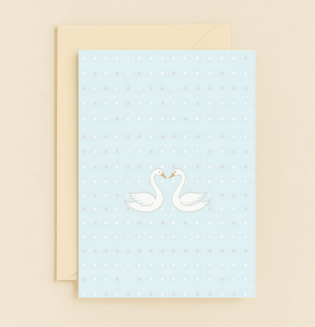 Celebrate timeless love with this elegant anniversary card featuring swans forming a heart against a pastel blue backdrop, perfect for romantic occasions.
