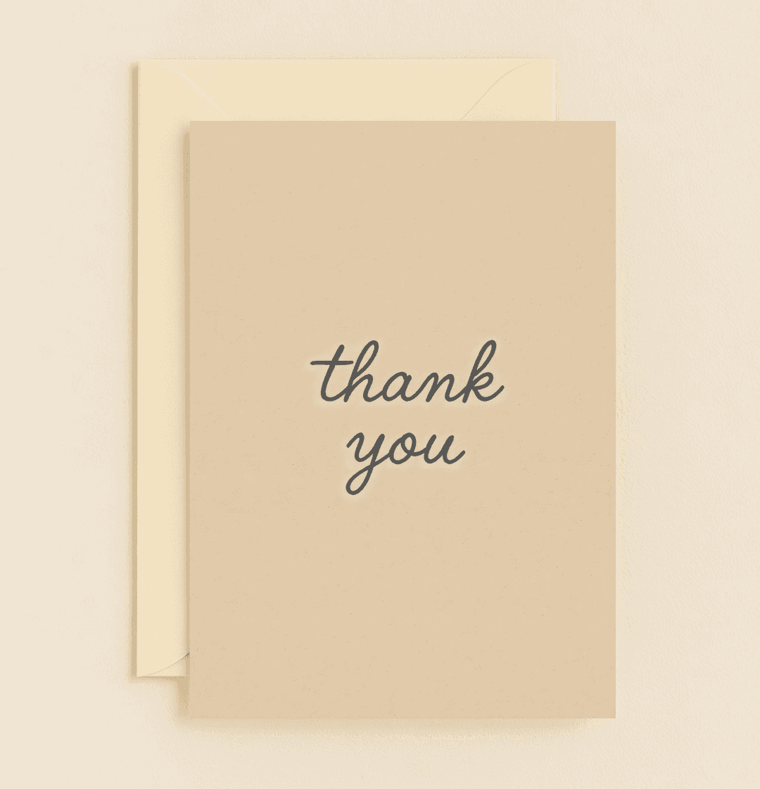 Express your gratitude with this elegant thank you card, featuring a minimalistic beige design and stylish black cursive font.