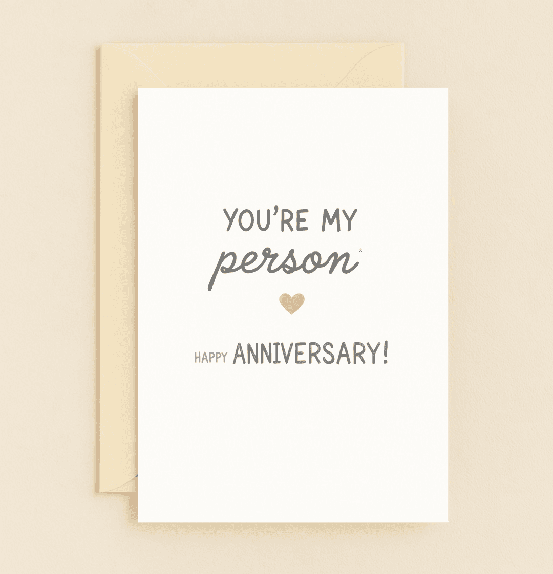 Celebrate your timeless love with this minimalistic anniversary card, featuring heartfelt sentiments and a touch of warmth through a pink heart design.