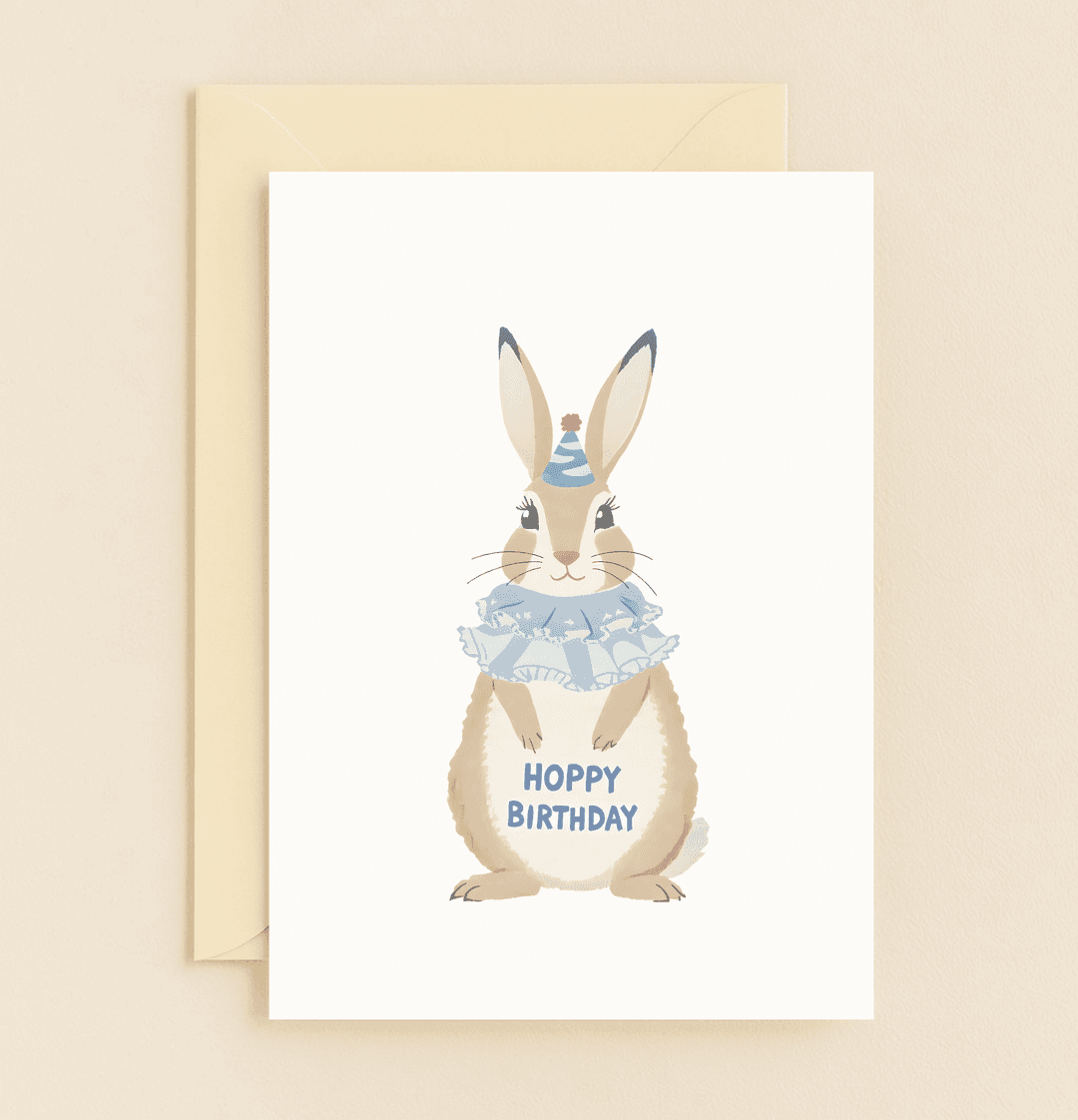 Send hoppy birthday wishes with this adorable card featuring a bunny in a party hat and ruffles, perfect for animal lovers and pun enthusiasts.