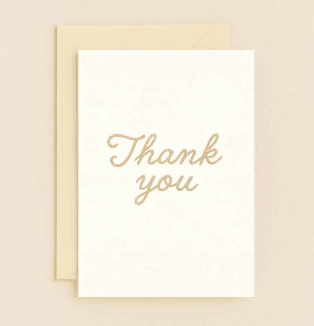 Express your gratitude with sophistication through this elegant, minimalistic card featuring "Thank You" in a striking gold cursive script.