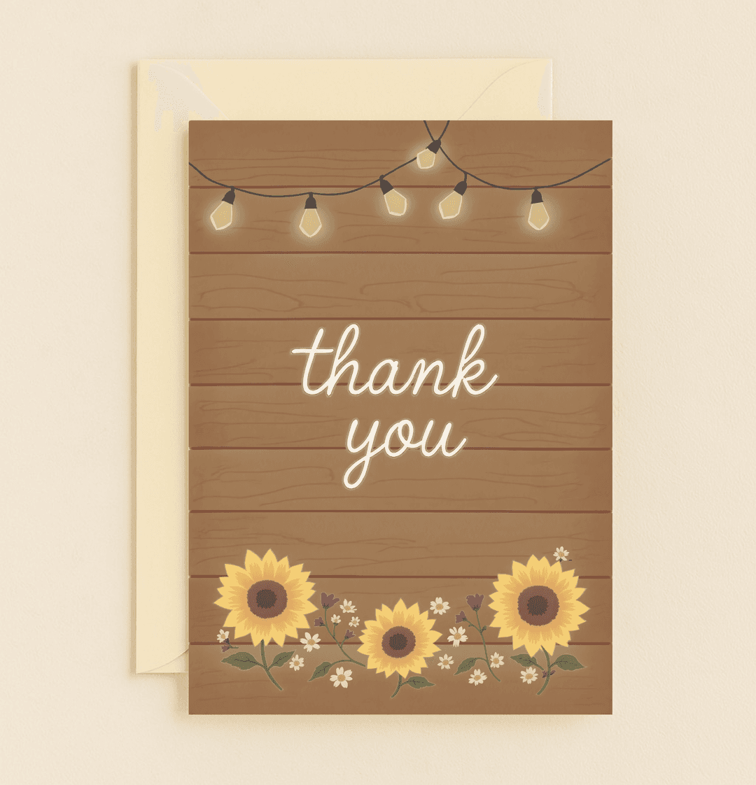 Express heartfelt thanks with this charming card featuring glowing string lights, rustic wood, and a vibrant bouquet of sunflowers and daisies.