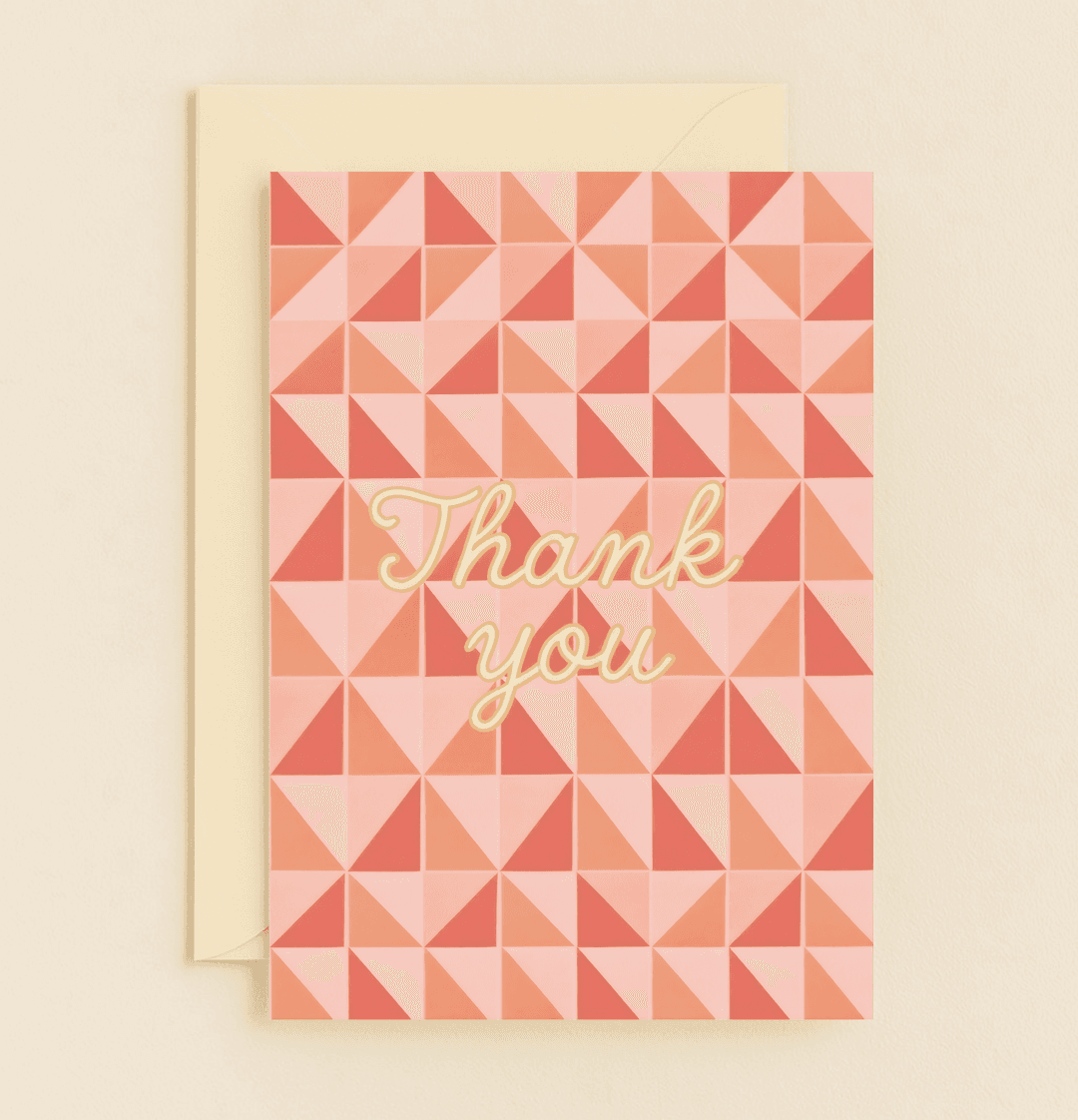 Express heartfelt appreciation with a striking geometric card featuring vibrant triangles and elegant golden "Thank you" script.