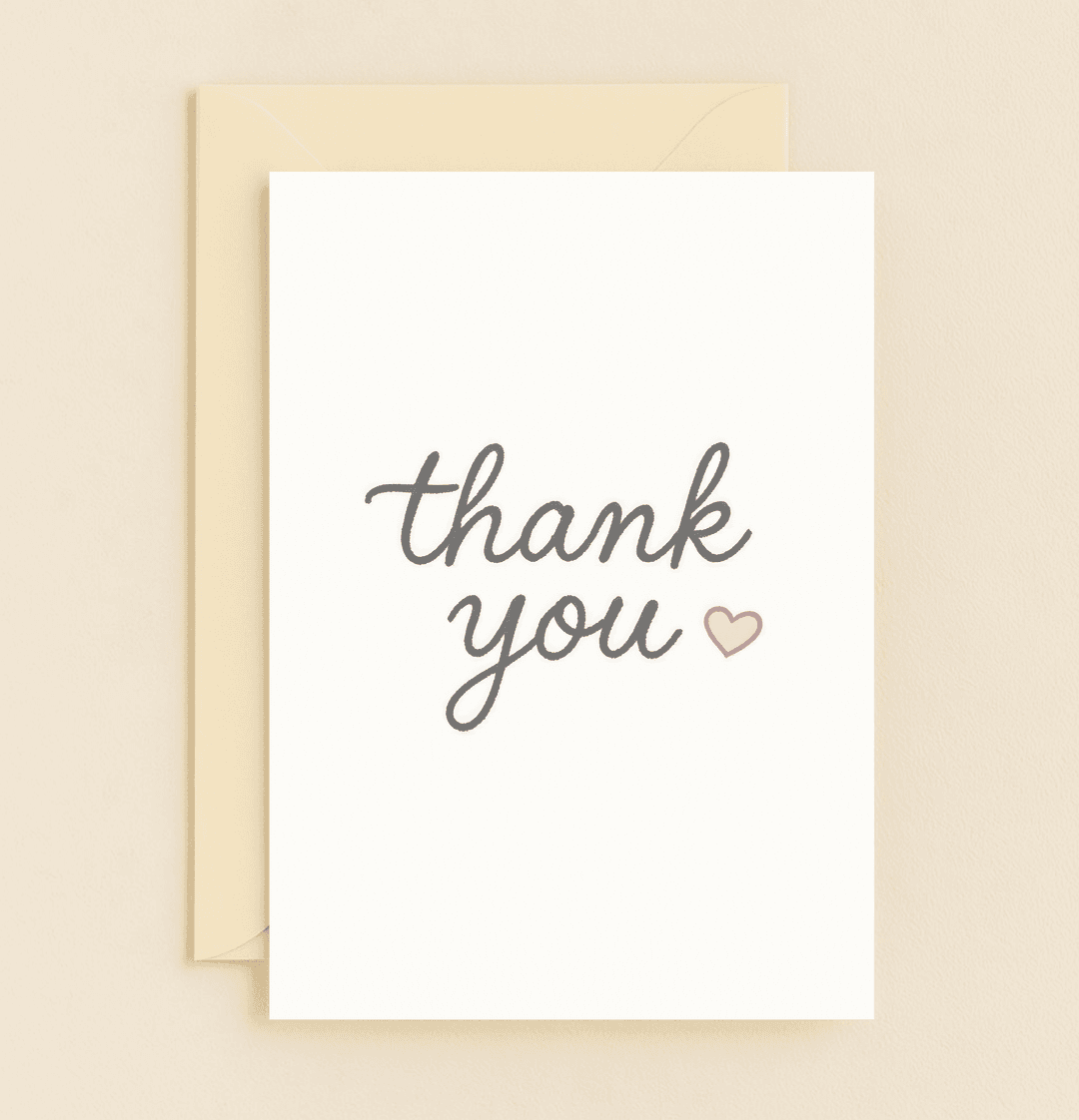 Express your gratitude elegantly with this minimalist thank you card, featuring cursive lettering and a charming pink heart on a crisp white background.