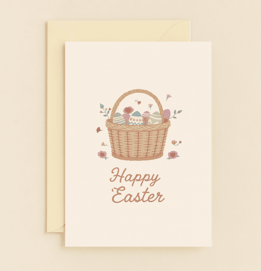 Celebrate Easter with a charming card featuring a pastel wicker basket brimming with decorative eggs, flowers, and the cheerful message "Happy Easter.