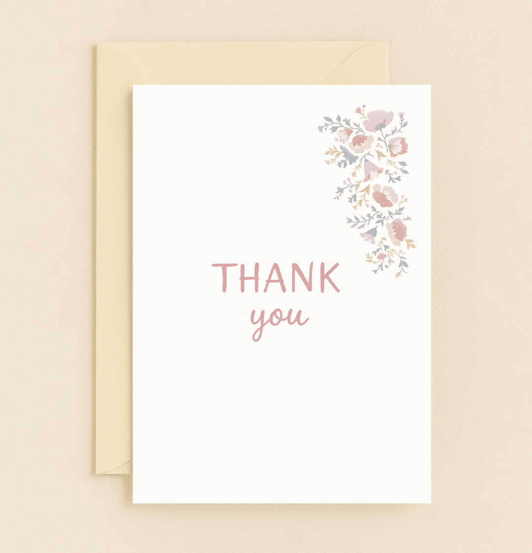 Express heartfelt thanks with this elegant card, featuring a pastel flower bouquet and a handwritten "THANK you" on a clean, sophisticated background.