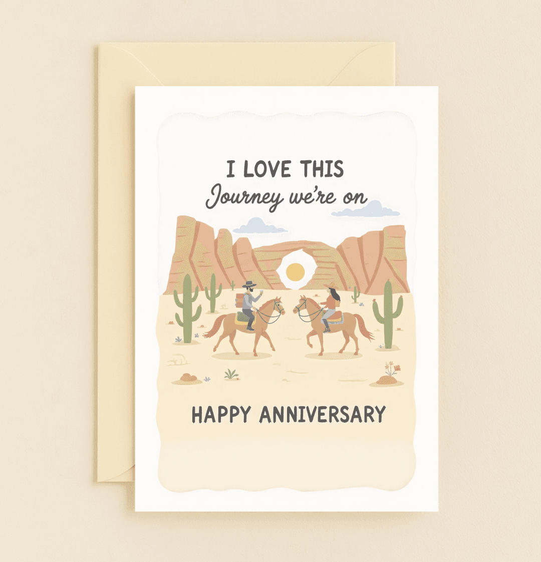 Celebrate your romantic journey with our "Desert Trails of Love" anniversary card, featuring a stunning sunset ride through a red rock desert landscape.