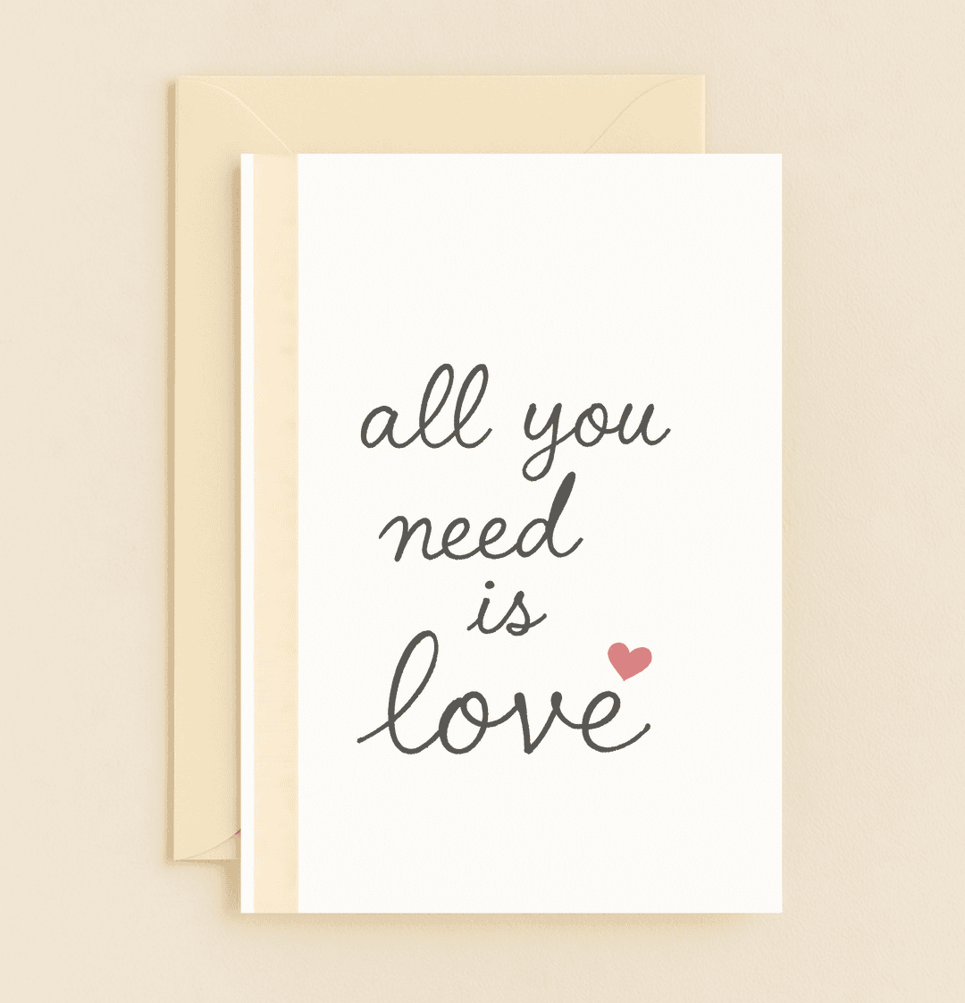 Celebrate your love with this minimalist anniversary card featuring The Beatles' iconic phrase "all you need is love" and a charming red heart.