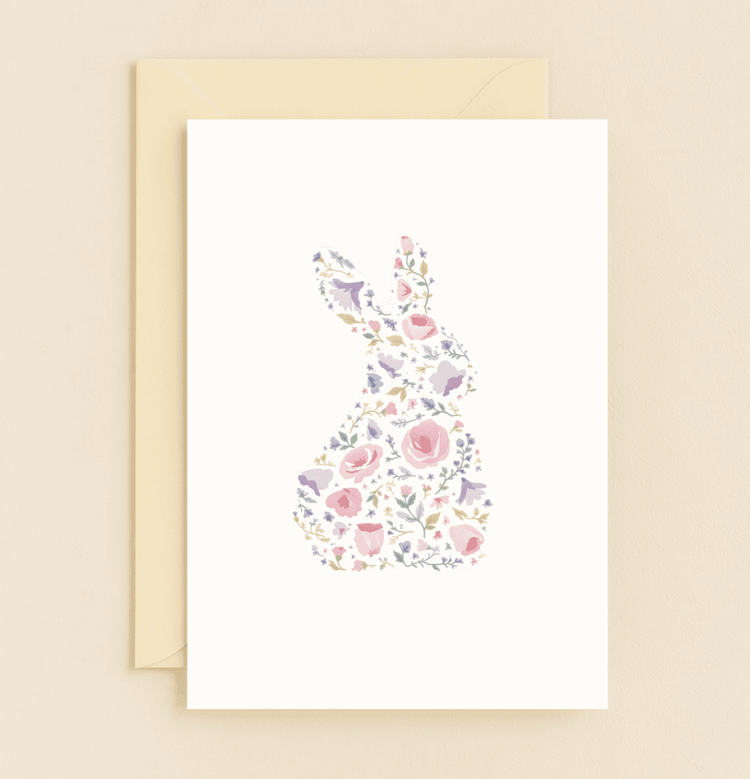 Celebrate Easter with a whimsical card featuring a pastel floral bunny, adorned with pink roses and vibrant spring hues.