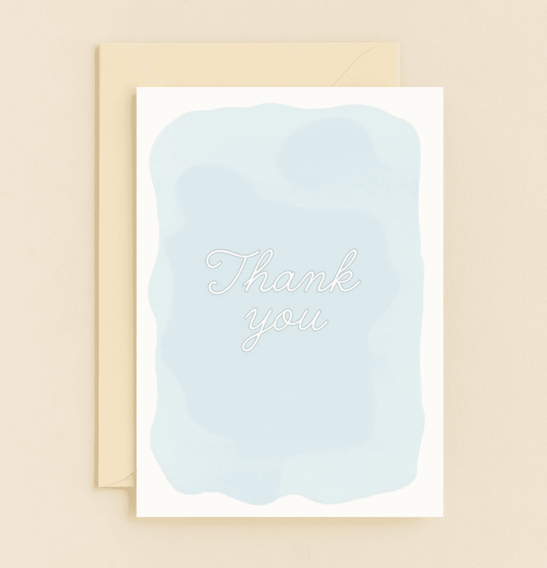 Express heartfelt thanks with this elegant card featuring a cursive "Thank you" on a serene watercolor background.