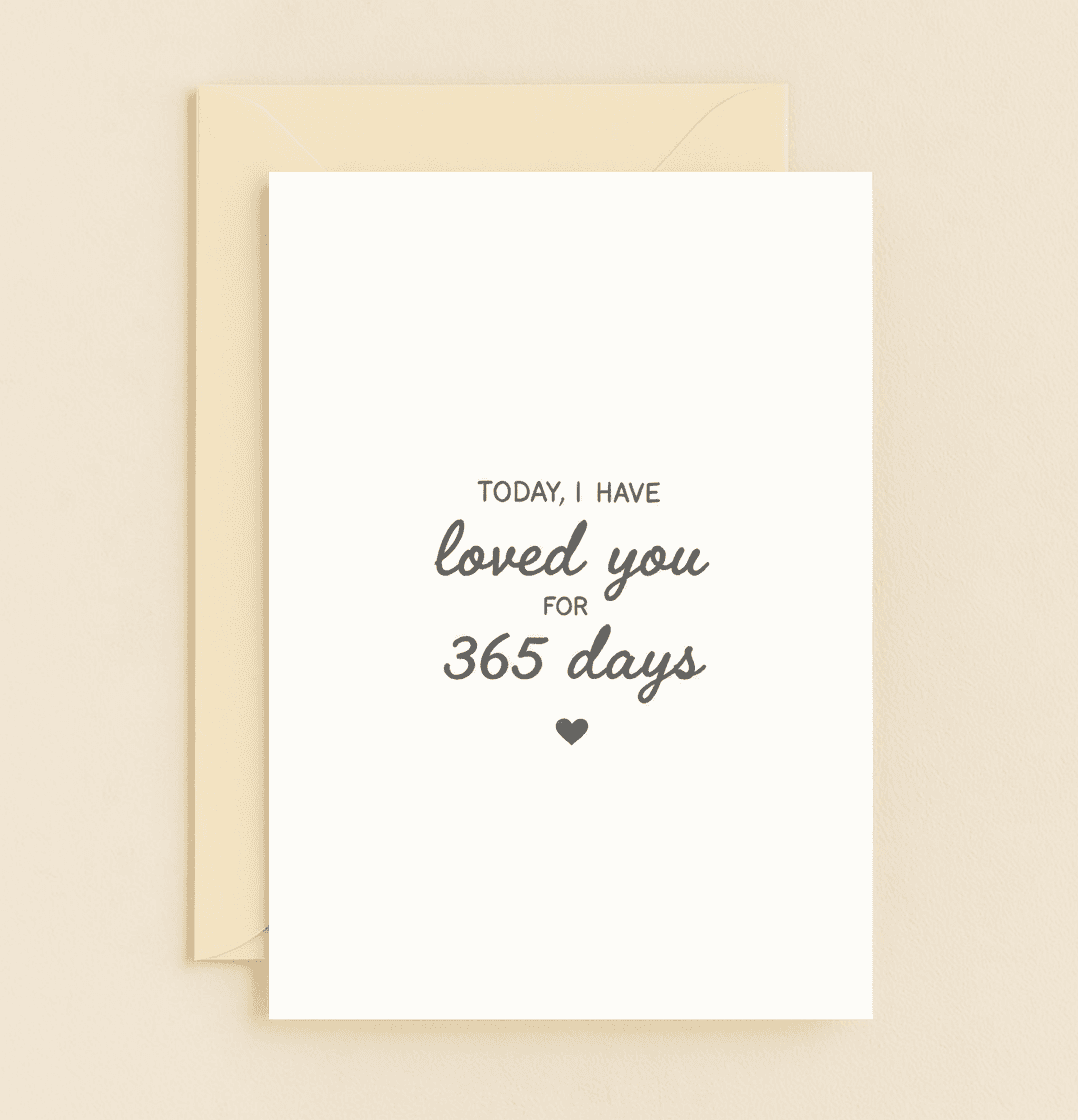 Celebrate your lasting love with our minimalist anniversary card, "A Year of Love and Counting," featuring heartfelt text and a charming heart symbol.