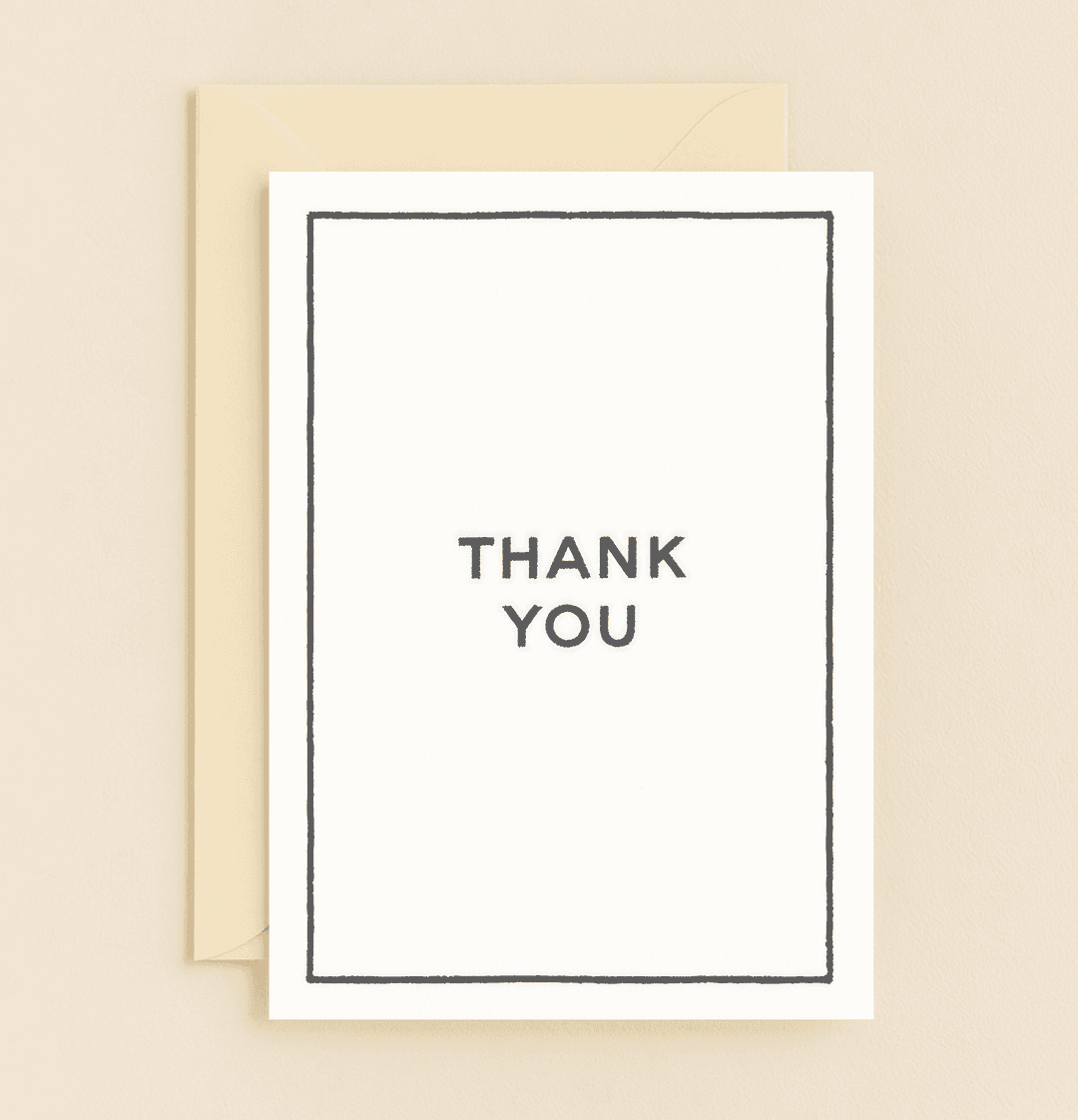 Express gratitude effortlessly with this minimalist thank you card, featuring a bold "THANK YOU" on a crisp white background with a black border.