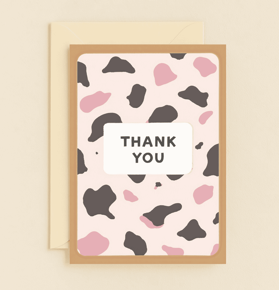 Say "thank you" in style with our "Spotted Appreciation: Moo-chas Gracias!" card, featuring playful cow spots and witty wordplay for a modern, minimalistic touch.