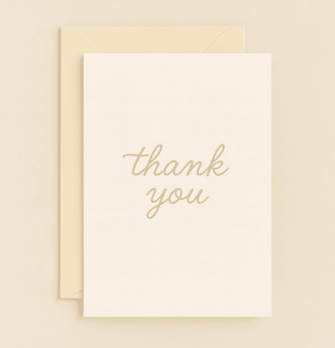 Express your appreciation with our "Gratitude in Golden Cursive" card, featuring elegant gold cursive on a minimalist beige backdrop for a sophisticated thank you.