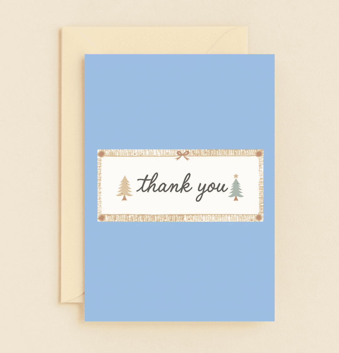 Express timeless gratitude with this elegant holiday-themed card, featuring pine trees, a gold star, and bows on a classic blue backdrop.