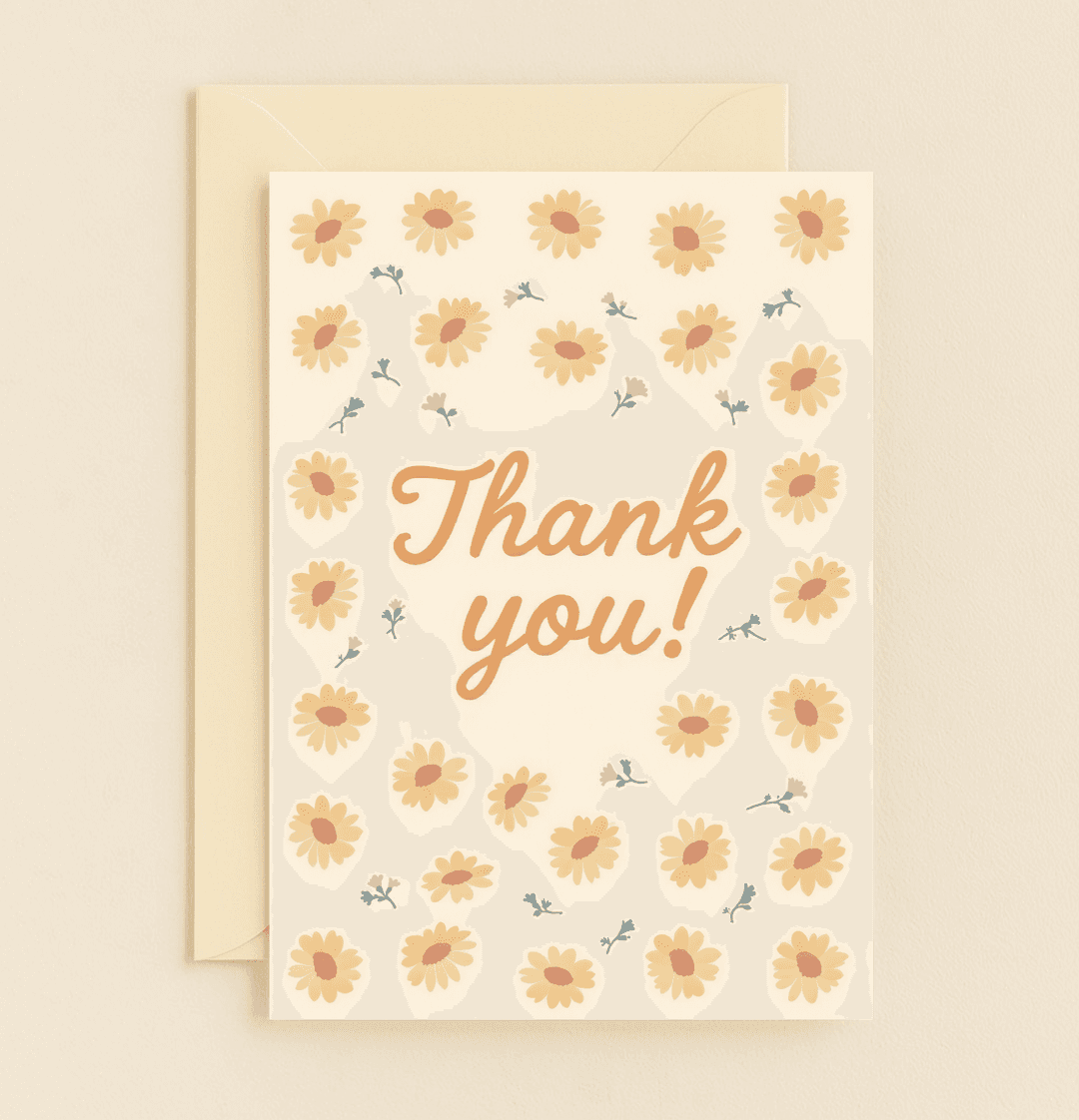 Brighten their day with a cheerful "Thank You" card featuring elegant orange lettering and a delightful floral design of yellow daisies and wildflowers.