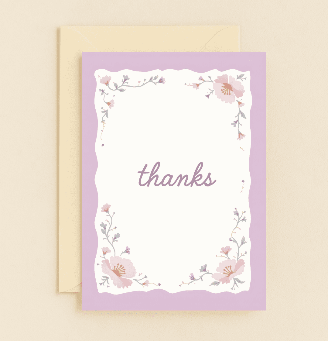 Express heartfelt gratitude with this elegant thank you card, featuring a delicate floral design in pink and purple hues with a graceful cursive "thanks.
