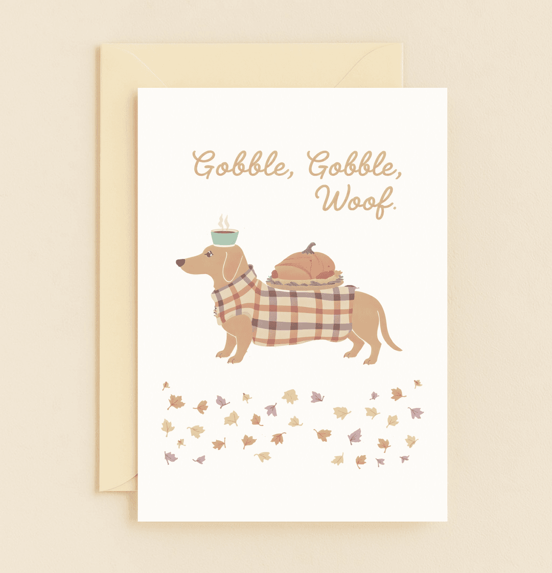 Celebrate Thanksgiving with a playful dachshund balancing a turkey and coffee amidst autumn leaves, delivering delightful wordplay with "Gobble, Gobble, Woof.