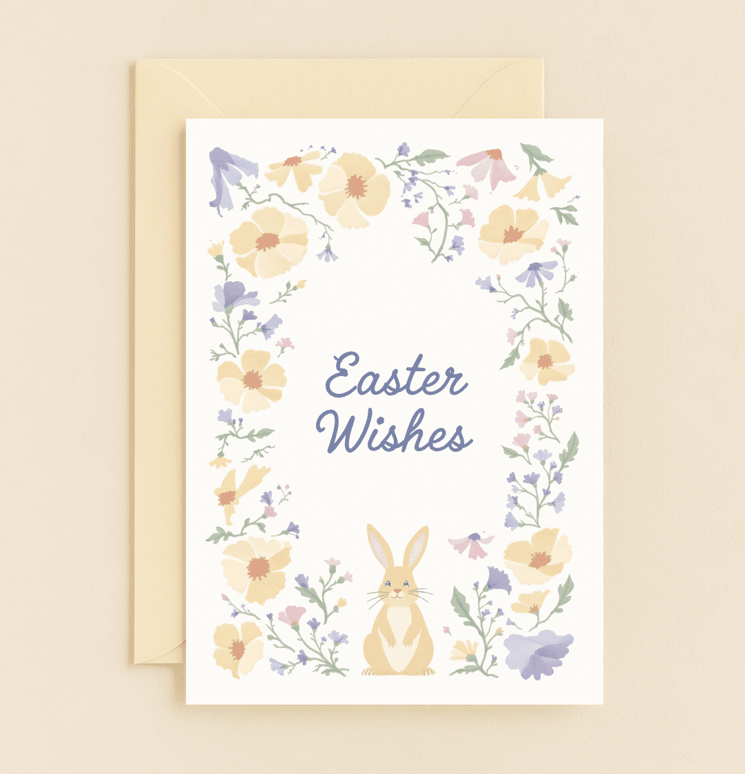Celebrate Easter with a charming card featuring pastel blooms, a playful rabbit, and delightful wordplay perfect for springtime greetings.