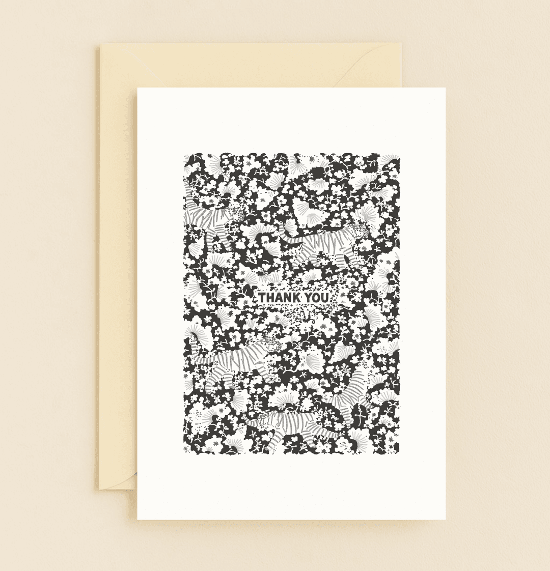Express gratitude with a whimsical touch through this striking card featuring surreal tiger and floral designs, perfect for those who appreciate unique humor.