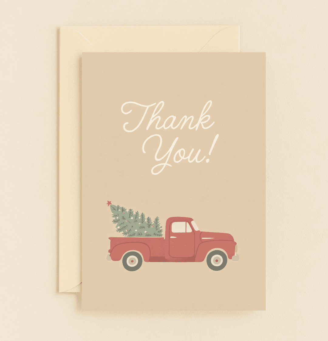 Send your heartfelt thanks with a festive touch through this vintage-inspired card showcasing a red pickup truck and a decorated Christmas tree.