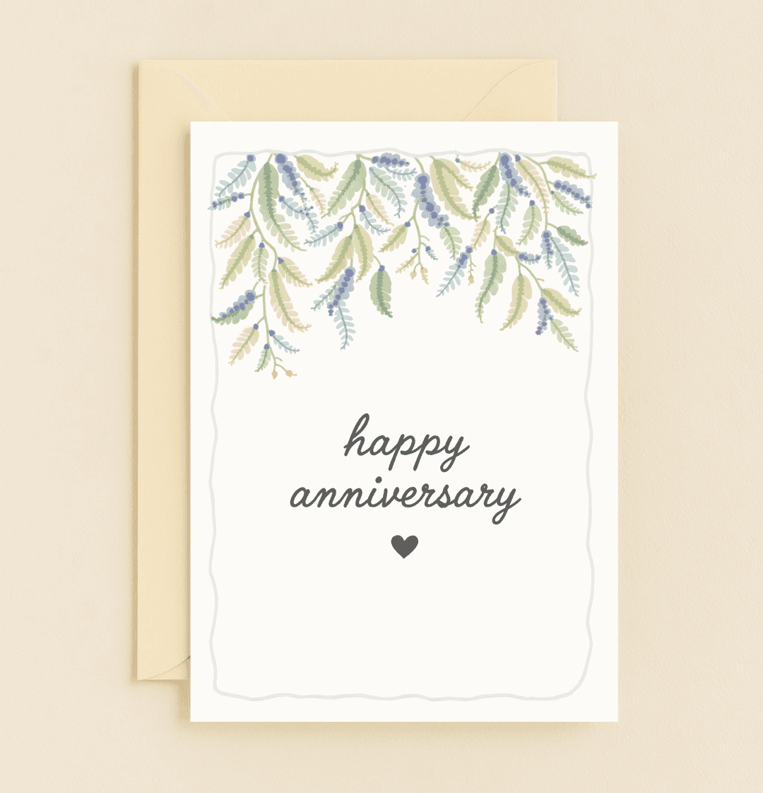 Celebrate love's milestones with this elegant anniversary card featuring watercolor leaves and berries, a heartfelt message, and a charming black heart.