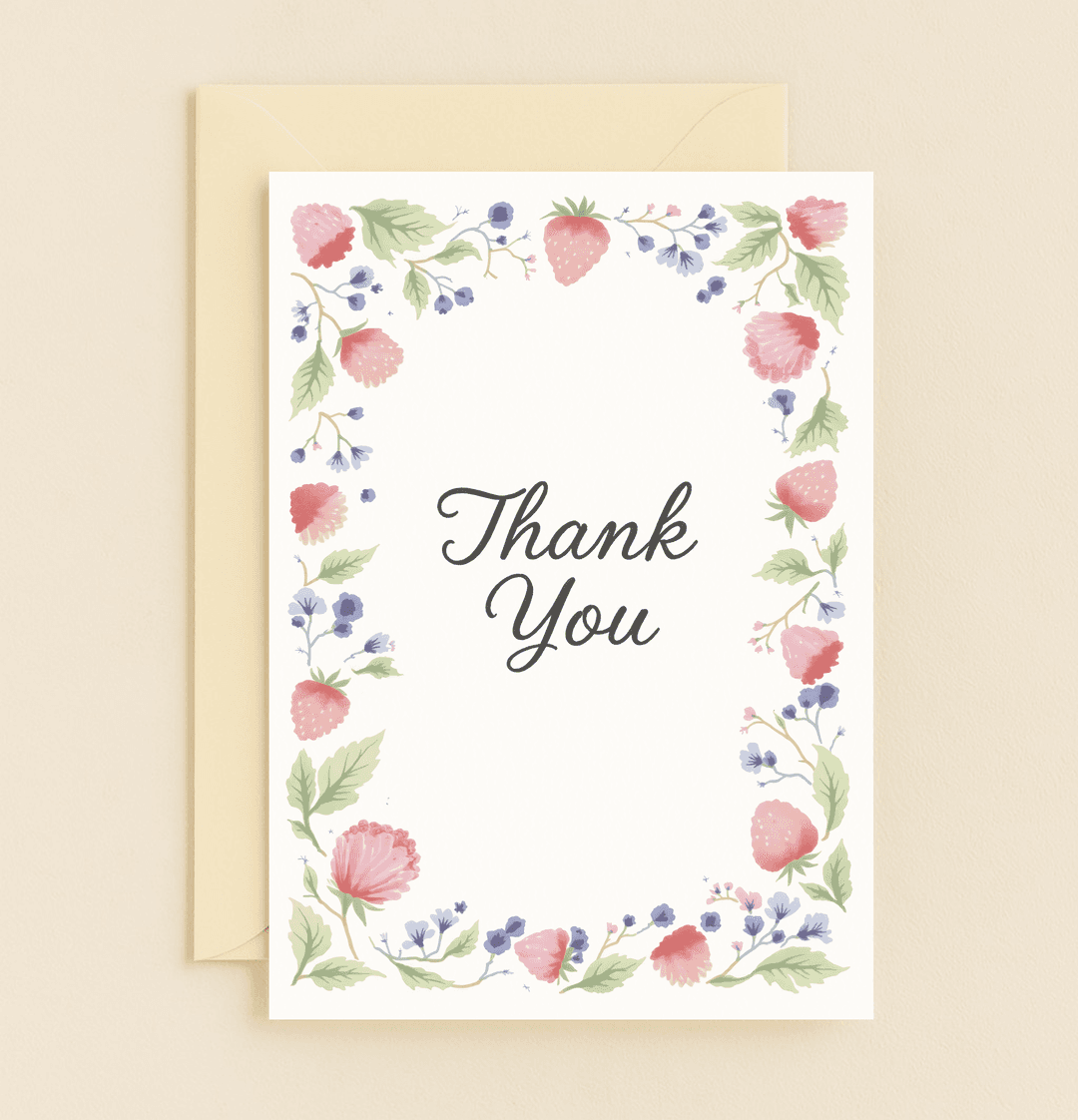 Express heartfelt gratitude with our "Berry Grateful" card, adorned with watercolor strawberries, flowers, and leaves in soft pinks, purples, and greens.