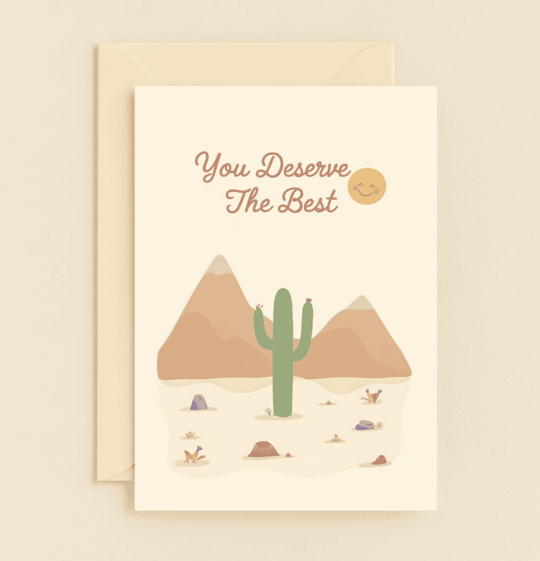Express your gratitude with the whimsical "Desert Dreams of Gratitude" card, featuring a cheerful cactus and pastel desert scene that says, "You Deserve The Best.