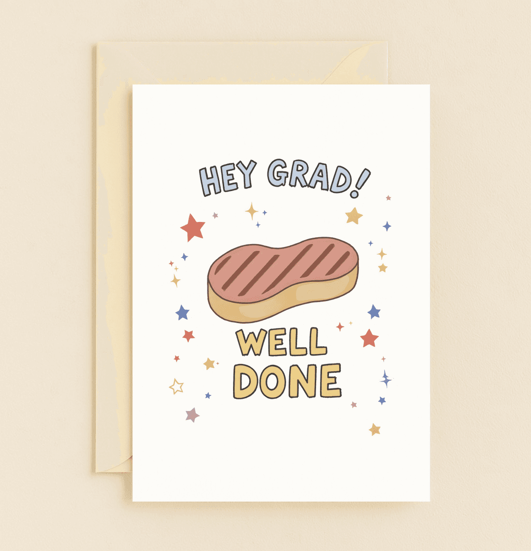 Celebrate their achievement with a punny graduation card featuring a steak illustration, playful wordplay, and colorful stars for a well-done grad!.