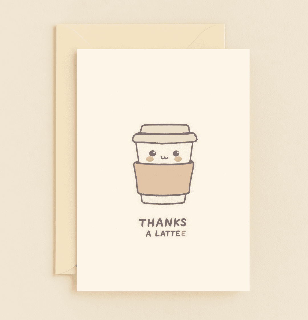 Express your heartfelt thanks with this cute greeting card featuring a smiling coffee cup and a playful "THANKS A LATTE" pun, perfect for any coffee lover.