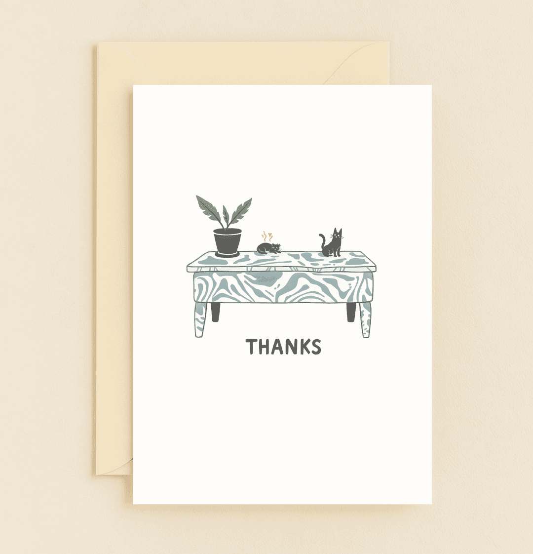 Thank your loved ones with this whimsical, minimalist card featuring cozy black cats and a charming swirl-patterned table, perfectly capturing gratitude and humor.