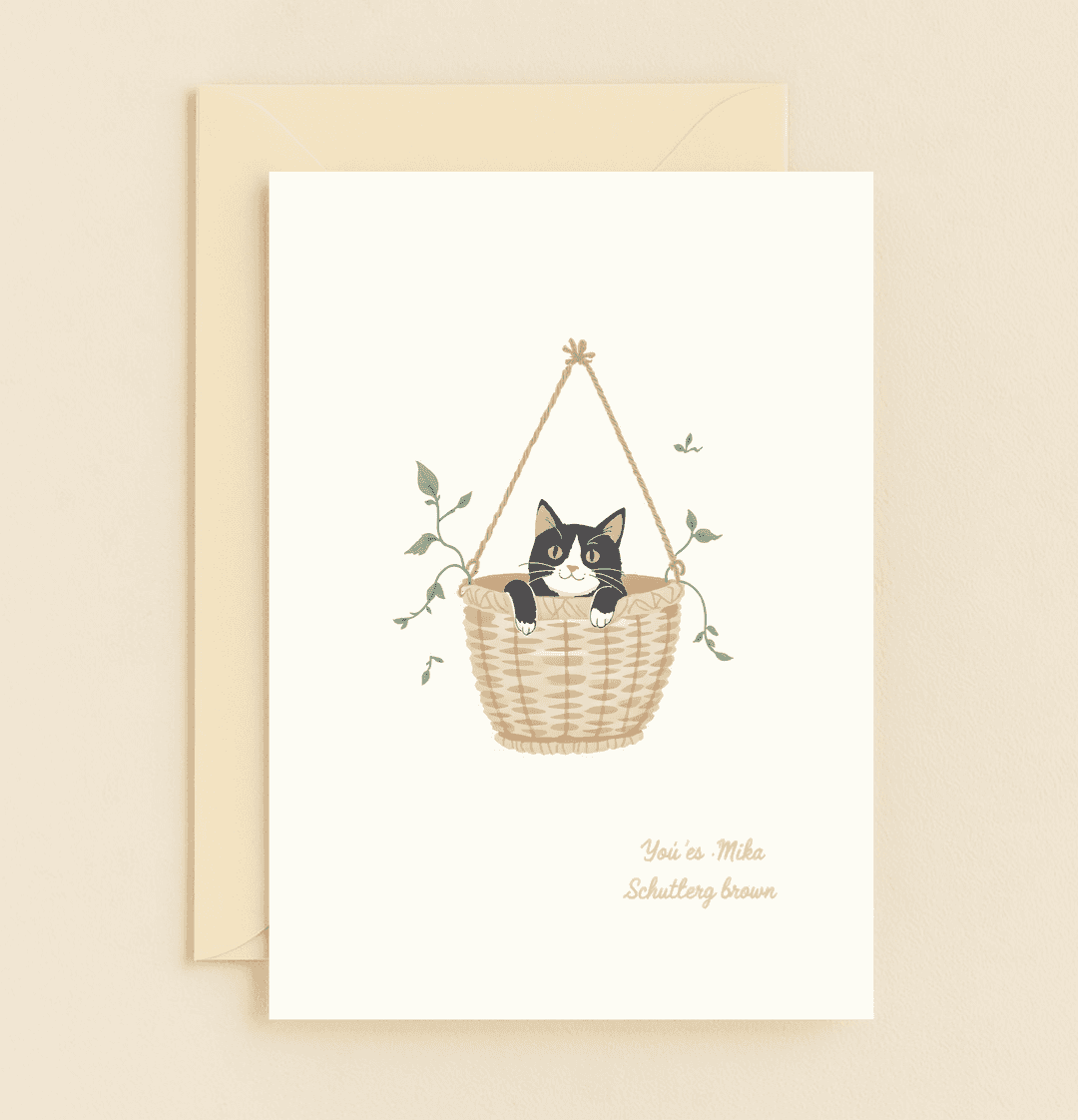 Delight your mom this Mother's Day with a whimsical card featuring a cozy cat nestled in a woven basket, creating a charming, nature-inspired scene.
