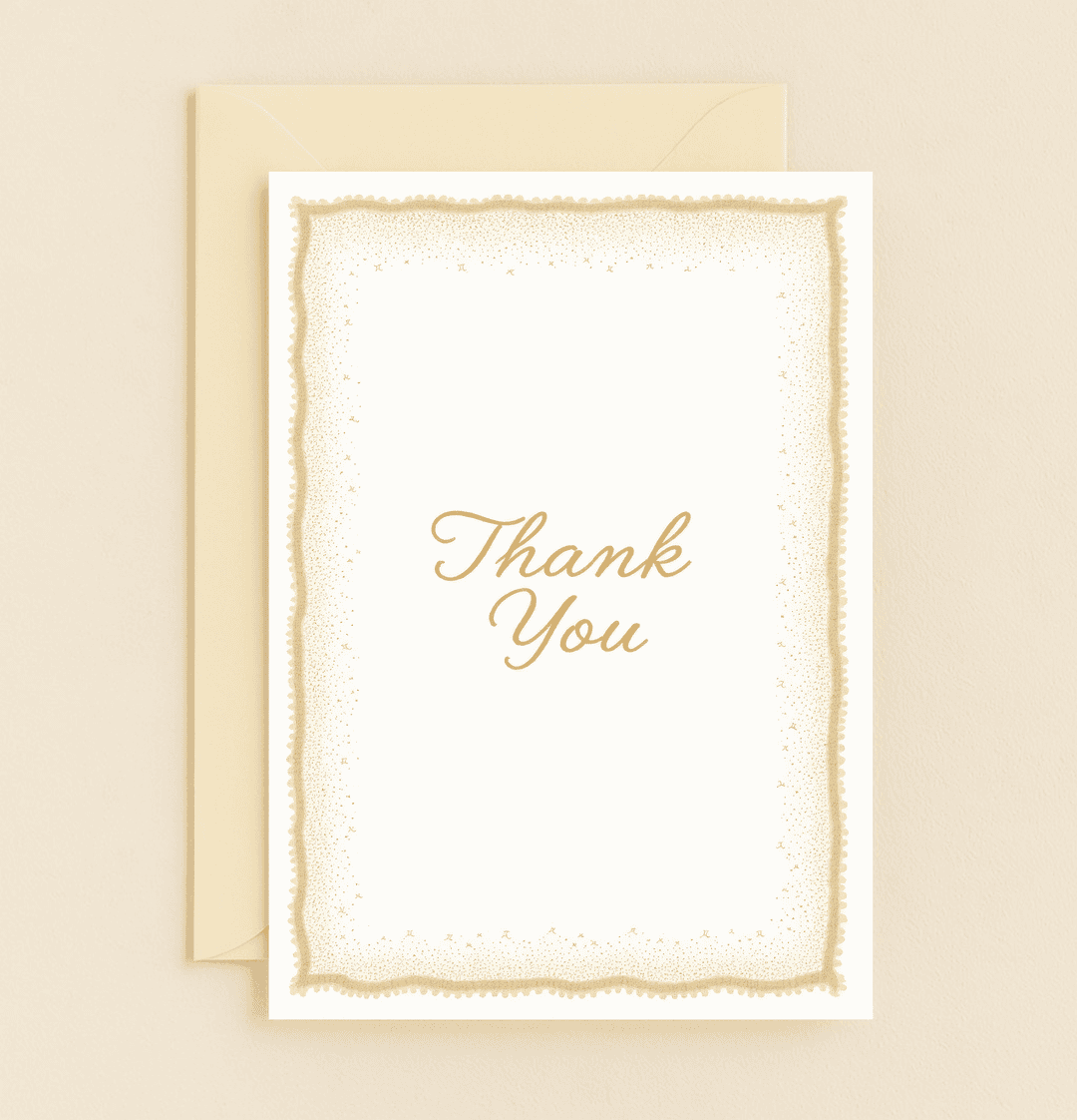 Elegant Expressions of Gratitude: This thank you card features a golden cursive "Thank You" with a lacy, decorative border for a timeless touch of elegance.