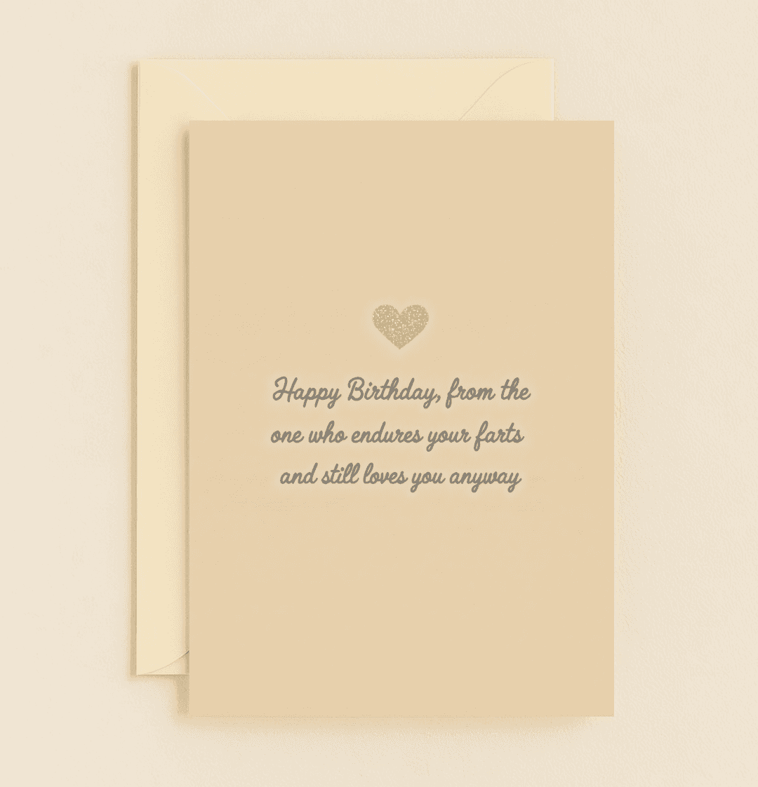 Celebrate enduring love with a glittery heart and humorous wordplay on this birthday card that embraces life's quirks with affection and laughter.