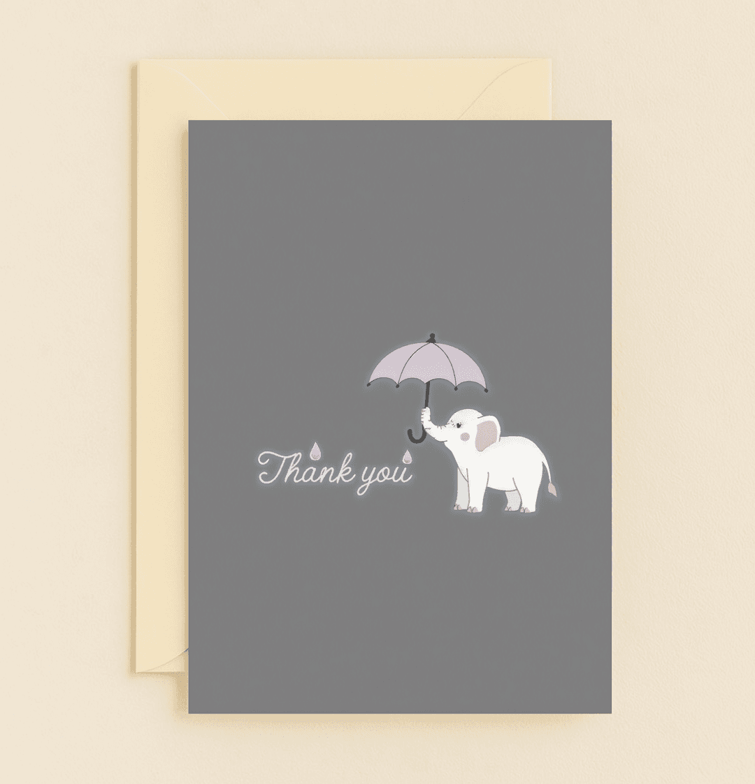 Express heartfelt gratitude with a whimsical touch through this charming card featuring an adorable elephant under a pink umbrella.