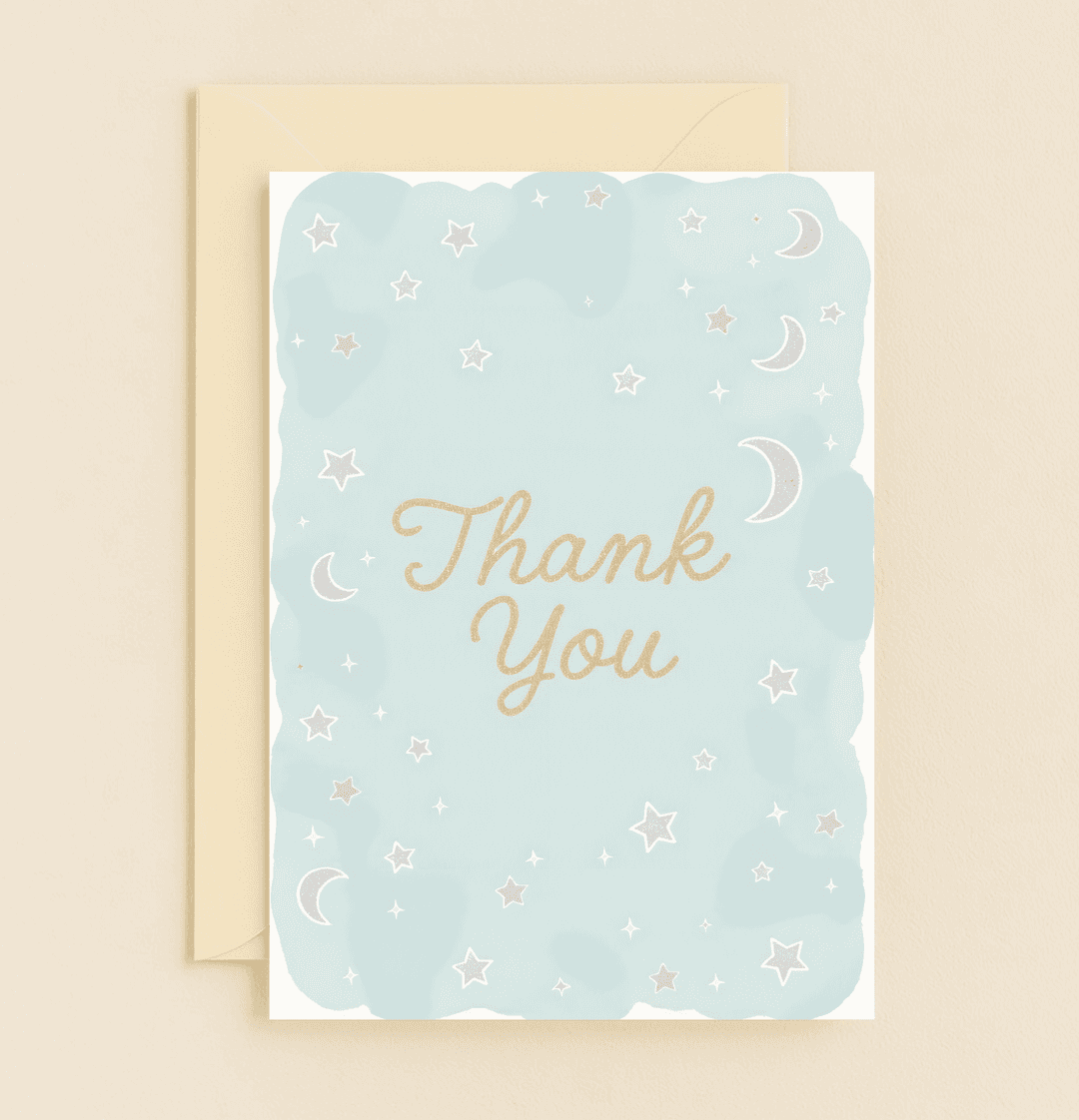 Express your appreciation with this celestial-themed greeting card, featuring hand-drawn stars and moons on a pale blue background, elegantly scripted "Thank You" in gold.