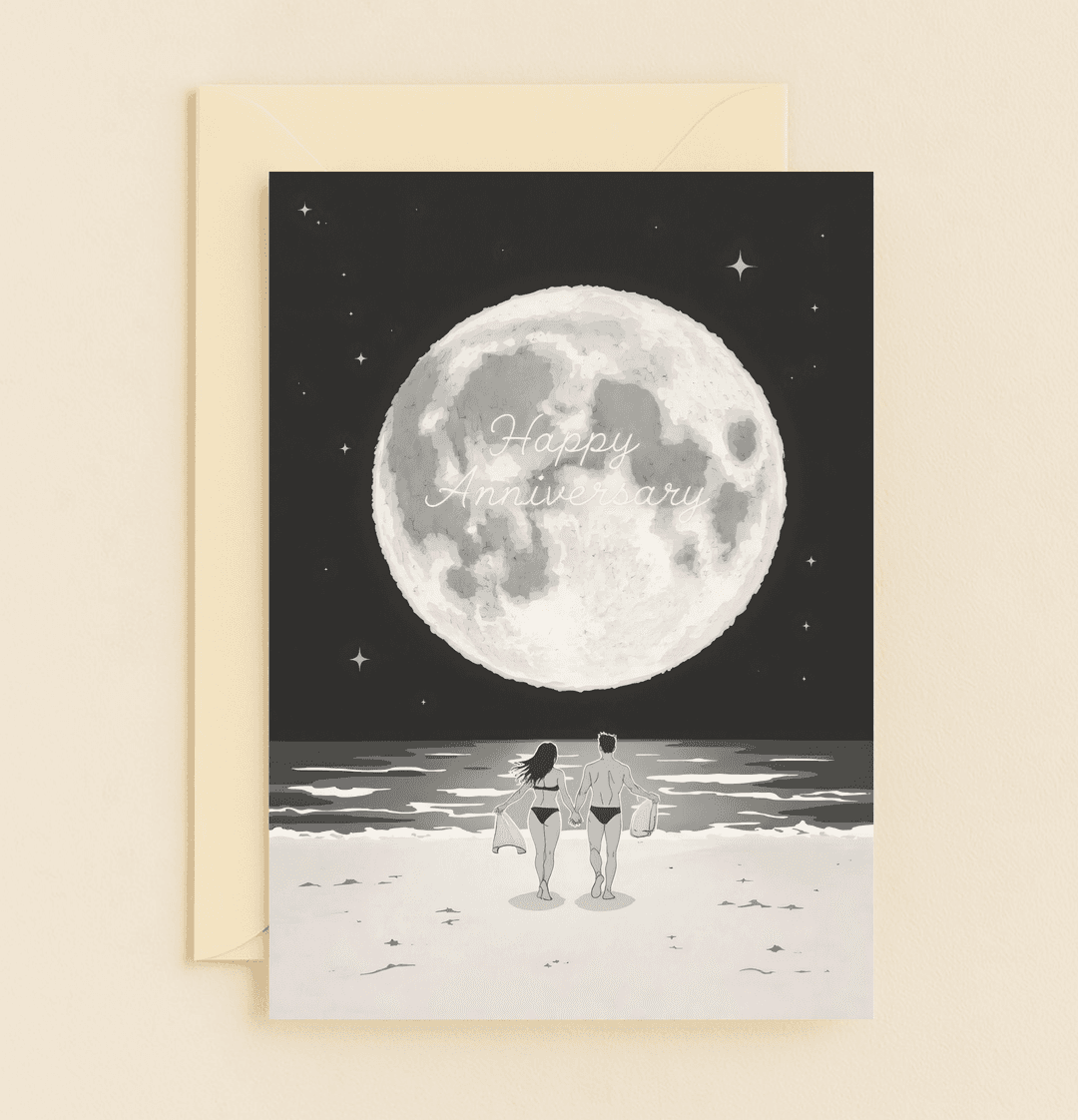 Celebrate your love with a serene anniversary card featuring a couple strolling under a starry night sky and full moon on a tranquil beach.