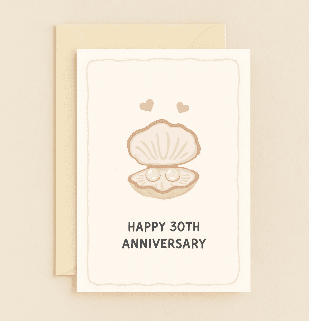 Celebrate 30 years of love with this elegant card featuring a clam shell and pearls, symbolizing enduring romance and heartfelt anniversaries.