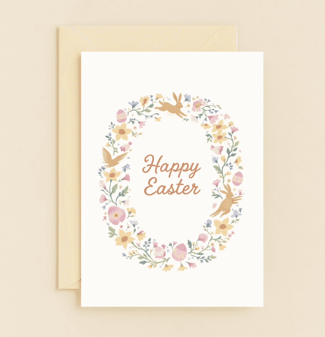 Celebrate Easter with our "Springtime Hops and Easter Blooms" card, featuring a charming floral wreath, playful rabbits, and colorful Easter eggs.