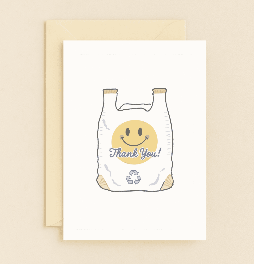 Express your gratitude with a touch of humor and eco-conscious flair using this smiley face card featuring a playful nod to recycling.