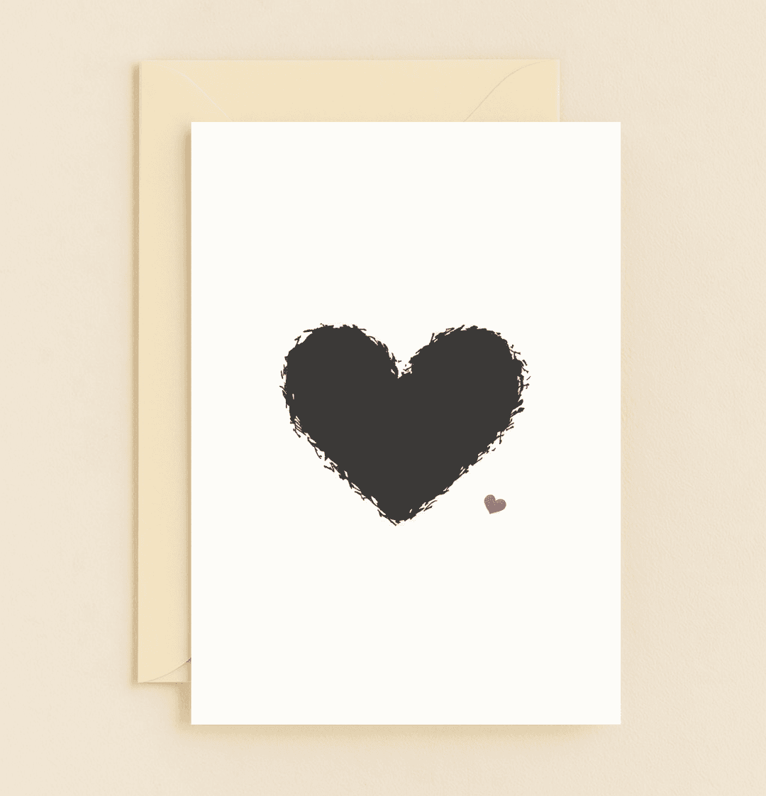 Celebrate your anniversary with "Heartfelt Moments, Infinite Love," a minimalist card featuring a bold black heart and a pop of red, symbolizing timeless love.