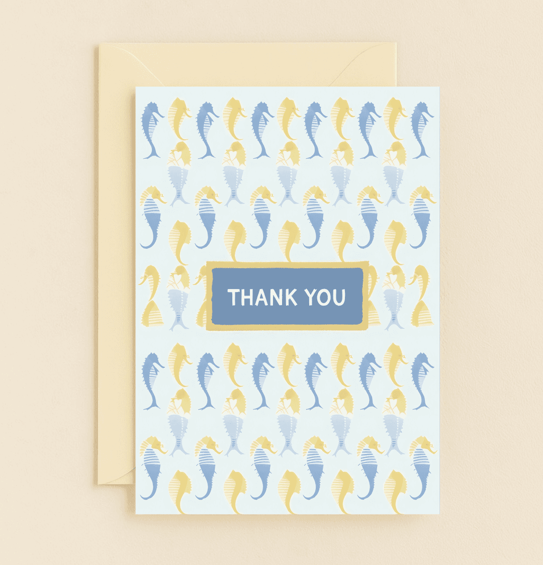 Express your gratitude with our Seahorse Salutations card, featuring a charming nautical design of blue and yellow seahorses and a bold "THANK YOU" centerpiece.