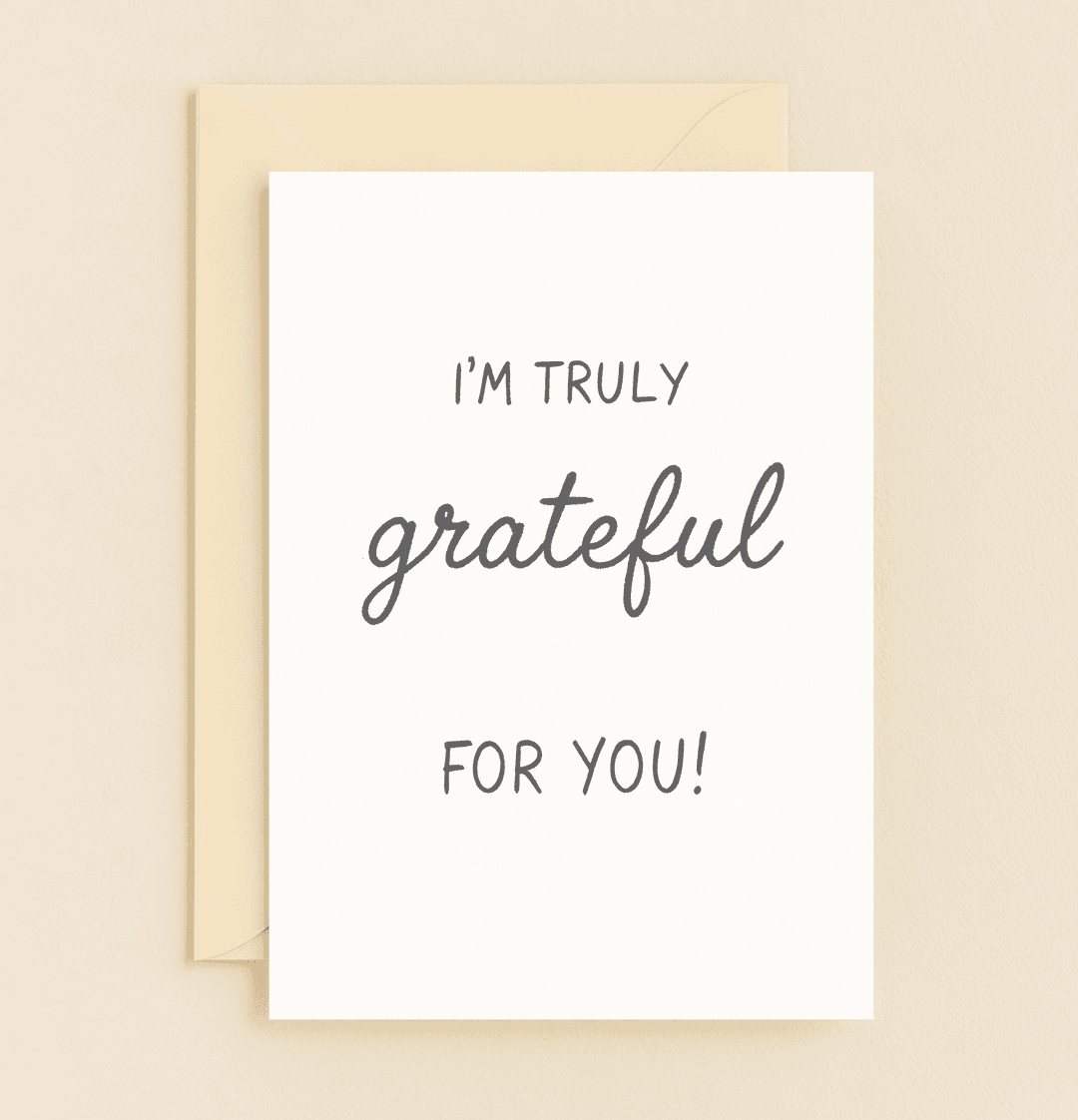 Express your heartfelt gratitude with this minimalistic thank you card, featuring elegant handwritten text and a standout cursive "grateful.