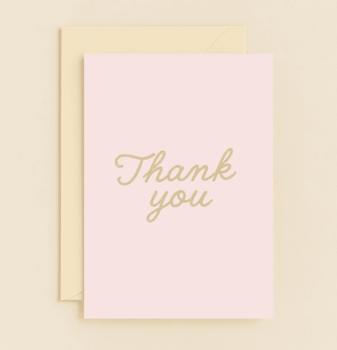 Express heartfelt thanks with this elegant pink card, featuring glittery gold cursive text to convey gratitude in minimalist sophistication.