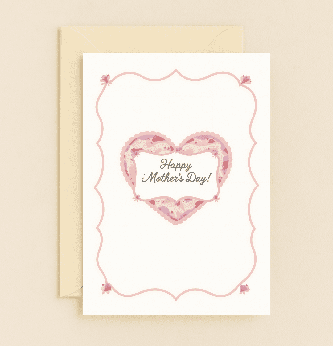 Celebrate Mother's Day with a delicate pink card featuring a heart-shaped floral design and elegant script, perfect for expressing your heartfelt love.